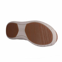 Ziera Sachet closed-toe shoe in tan leather with floral cutout detailing, breathable design, cushioned footbed, and low-profile sole on a white background