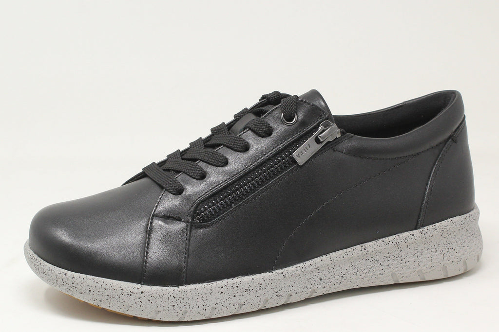 Black sneaker with a gray sole on a white background
