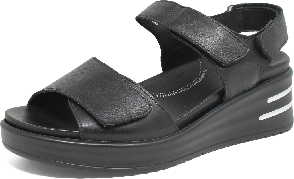 Black sandal with a platform sole on a white background