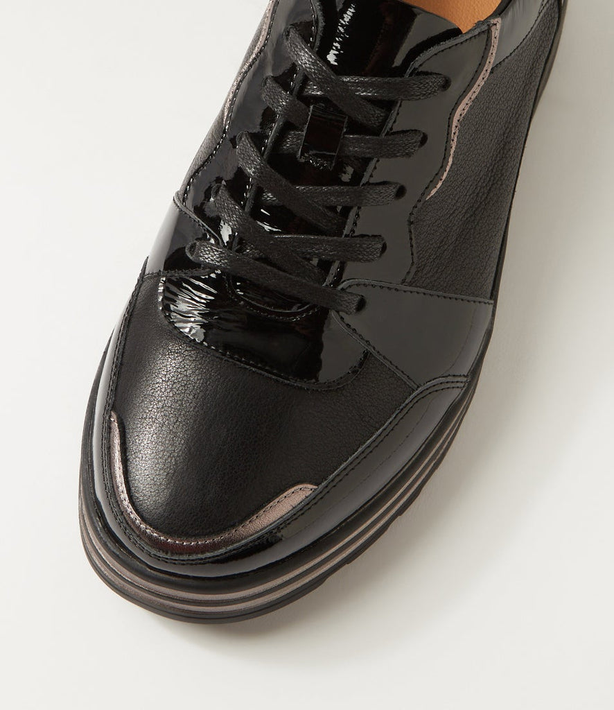 Ziera Vressa casual lace-up shoe in black leather with metallic accent details, rounded toe, cushioned footbed, and black sole on a white background