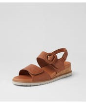 Ziera Vatch wedge sandal in tan leather with adjustable straps, cushioned footbed, and mid-height wedge sole on a white background